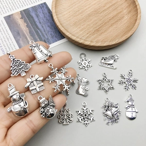 Antique silver Christmas charms set including snowflakes and bells for DIY jewelry making