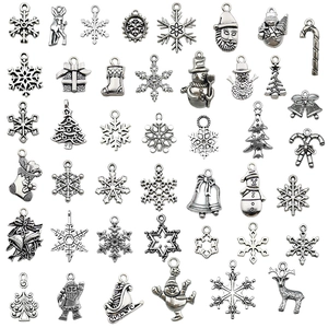 Set of 38 antique silver Christmas alloy charms including snowflakes and Santa for DIY jewelry