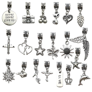 Antique silver alloy mixed charms set featuring maple leaf and high heel shoe designs