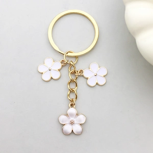 Porte-clés Fleur Blanche Huile Goutte Pastorale Alliage de Zinc Couleur Or Anneau de Clé Pendentif Sac Floral Bijoux de Mode