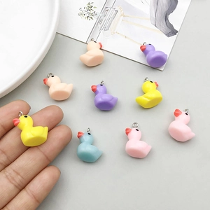 Colorful resin duck charms for DIY jewelry making featuring vibrant macaron colors