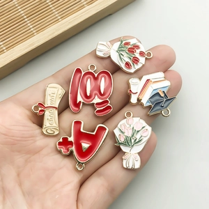 Vibrant enamel graduation charm set for DIY jewelry with tulips and graduate scroll