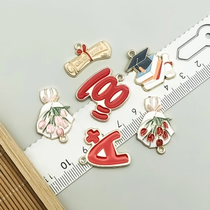 Enamel graduation charms including diploma and cap for DIY jewelry making with ruler scale