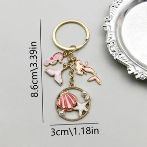Pink mermaid and seahorse keychain with pearl and rhinestone gold alloy charms