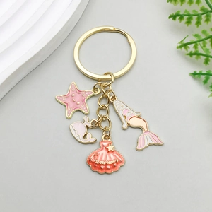 Porte-clés en alliage thème océan avec sirène dorée et baleine étoile de mer rose