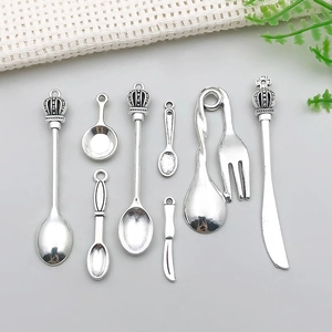 Antique silver alloy miniature cutlery charms set featuring spoons, forks, and knives