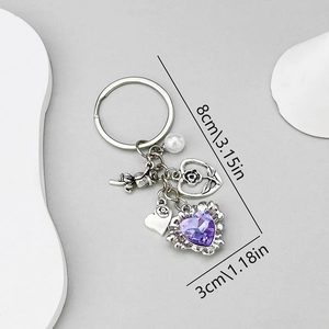 Porte-clés rose en argent antique avec cœur en cristal violet et perle blanche