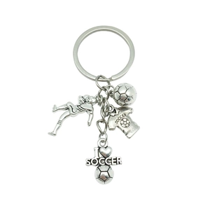 Antique silver soccer jersey keychain with football charms and player silhouette