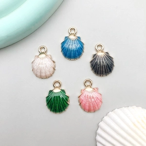 Colorful shell charm pendants in five enamel colors with golden metal borders