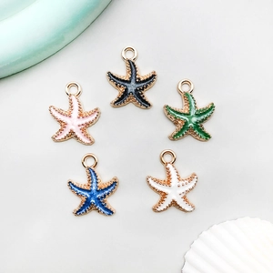 Five colorful enamel starfish charms with gold edges and dots for DIY jewelry making