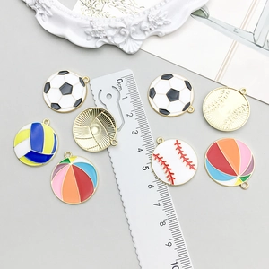Colorful sports ball charms with ruler showing 2cm diameter for DIY jewelry projects