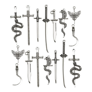 Set of vintage antique silver alloy charms featuring swords, daggers and gothic motifs