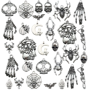 Antique silver Halloween charms set featuring spiders skulls and skeletons for DIY jewelry