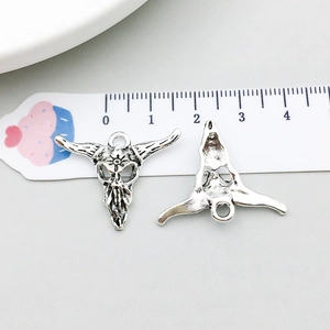 Detailed front and back view of retro silver ox skull pendants for DIY jewelry making