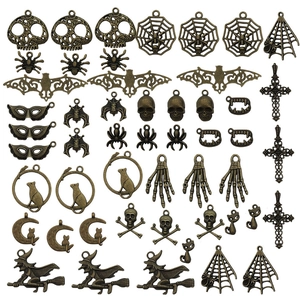 Set of 51 antique bronze Halloween charms including skull spider and bat for DIY jewelry