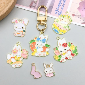 Detail of colorful Easter bunny charms in enamel alloy for DIY jewelry and keychain sets