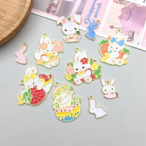 Detailed view of colorful rabbit pendants in enamel alloy for DIY jewelry making