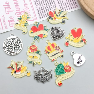 Detail of colorful enamel flower pendants and silver charms for Mother's Day DIY jewelry