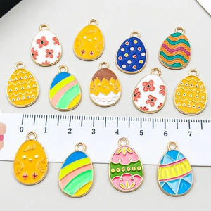 Colorful Easter egg enamel charms for DIY jewelry making featuring floral and chick patterns