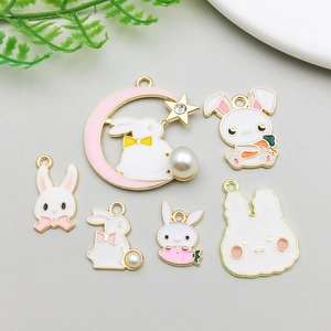 Detail of assorted Easter rabbit charms featuring enamel finish and faux pearls for DIY jewelry