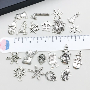 Antique silver Christmas charms set with Santa, reindeer and snowflake for DIY jewelry