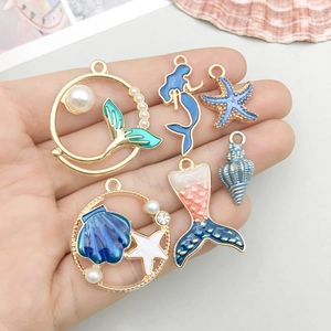 DIY blauwe emaille oceaan schelp en zeester hangers set voor sieraden maken