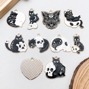 Gothic Halloween cat pendants set with black white enamel for DIY jewelry making