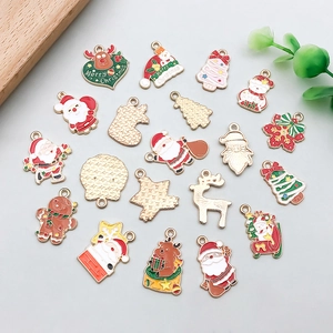 Detailed close-up of mixed Christmas alloy charms for DIY jewelry and festive crafts