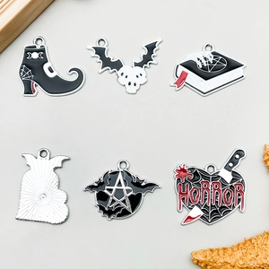 Set of 6 Halloween enamel charms with bat, skull, and magic book designs for DIY jewelry