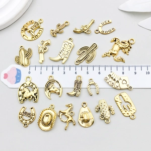 Set of vintage gold western cowboy charms including boots and hats for DIY jewelry making