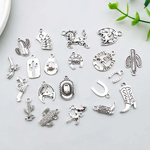 Vintage silver western cowboy alloy charm set including horseshoe and cactus pendants