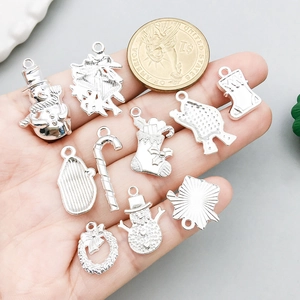 Set de colgantes navideños plateados con muñeco de nieve para creación de joyas DIY