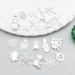 Colgantes de Navidad de plata con muñeco de nieve y copos para bisutería artesanal DIY