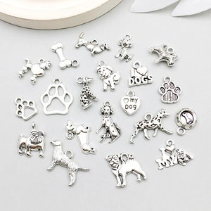 Antique silver dog charms set featuring various breeds and bone pendants for DIY jewelry
