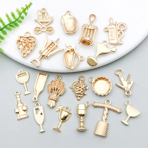 DIY jewelry making kit featuring golden wine bottle, glass, and grape pendants charms set