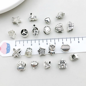 Vintage silver alloy charms assortment with starfish and crown shapes for DIY jewelry