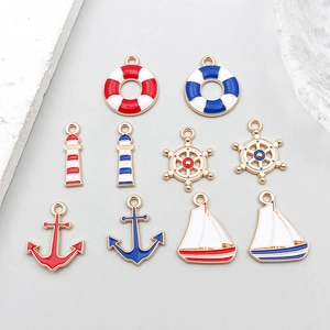 Detailed set of 10 nautical enamel pendants featuring anchor and helm for DIY jewelry