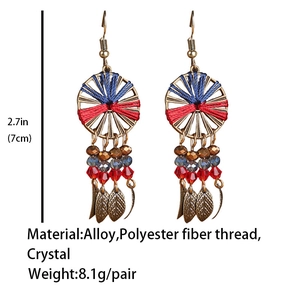 Detail showing Bohemian dreamcatcher earrings with crystals and leaf pendants