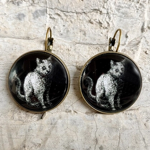 Vintage bronze lever-back earrings with realistic white cat pattern under glass cabochon