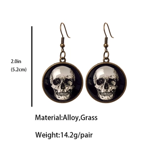 Detailed view of vintage skull glass stud earrings with 5.2cm size and alloy material