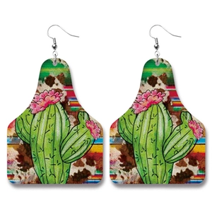 Western Christmas cow tag leather earrings with cactus floral print and cowhide pattern
