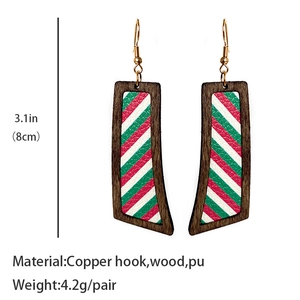 Detail showing 8cm Christmas wood earrings with red and green striped PU leather and copper hooks
