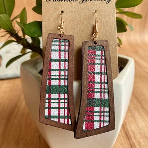 Detail of vintage Christmas plaid PU leather earrings in a geometric wooden frame