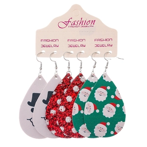 Three pairs of Christmas teardrop faux leather earrings with snowman and snowflake designs