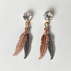 Orecchini a Pendente Etnici in Lega con Piuma e Zirconia Stile Vintage Boemo per Donna Metallo Bicolore Gioielli Quotidiani Vacanza