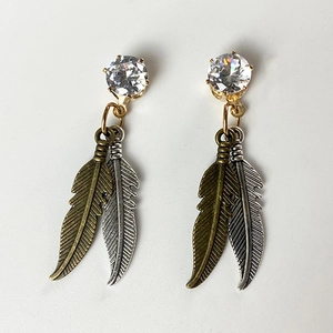 Orecchini pendenti a piuma vintage western con zircone in finitura argento e bronzo