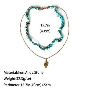 Western-stijl dubbellaagse halsketting met turquoise stenen en een gouden cactus hanger