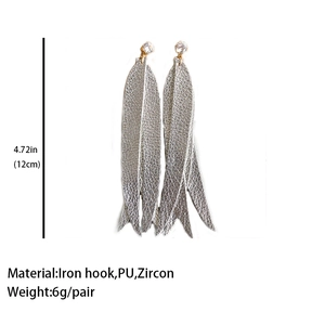 Detail of layered silver faux leather leaf earrings with zircon gold hook and 12cm size info