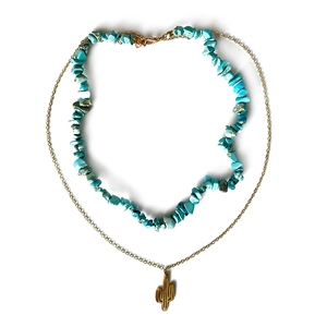 Dubbellaagse western ketting met blauwe turquoise stenen en gouden cactus hanger