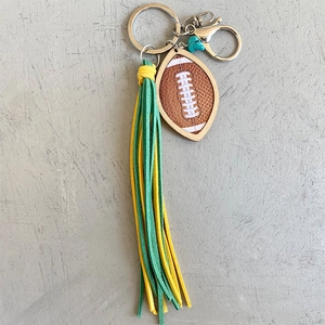 Porte-clés rugby avec pompon jaune-vert et pendentif en pierre de turquoise